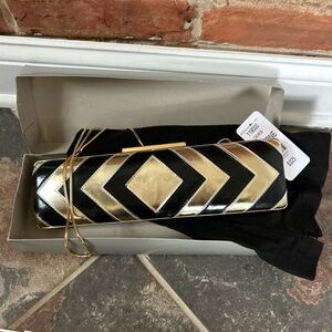 Carlisle Black and Gold Leather Chevron Clutch